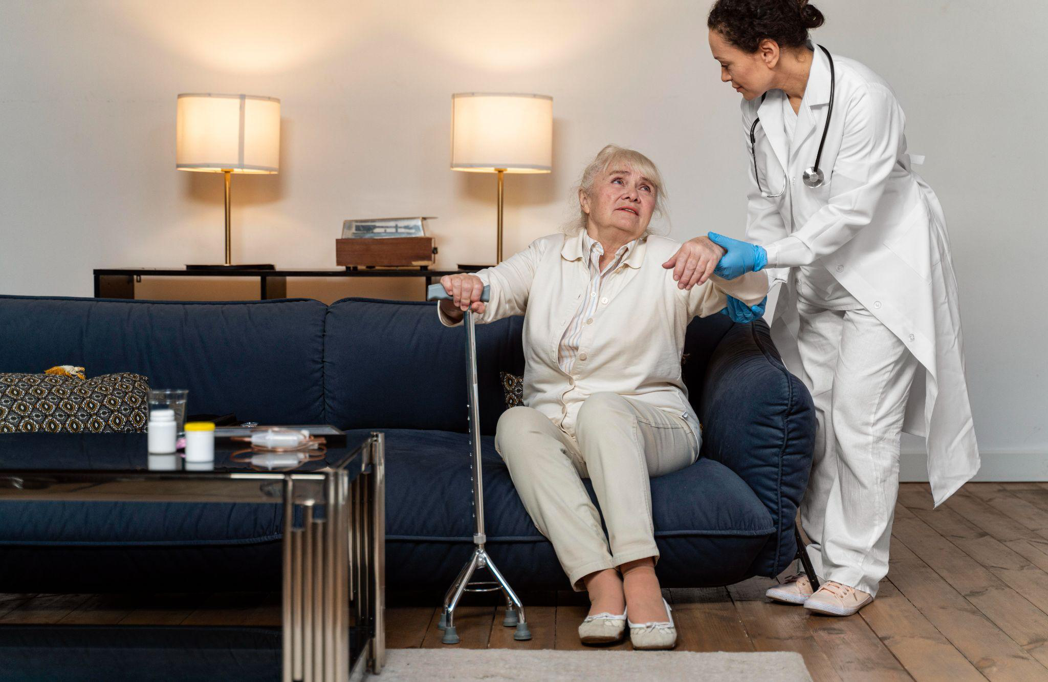 Older adult receiving supportive companionship and assistance at home in Burlington County, NJ.